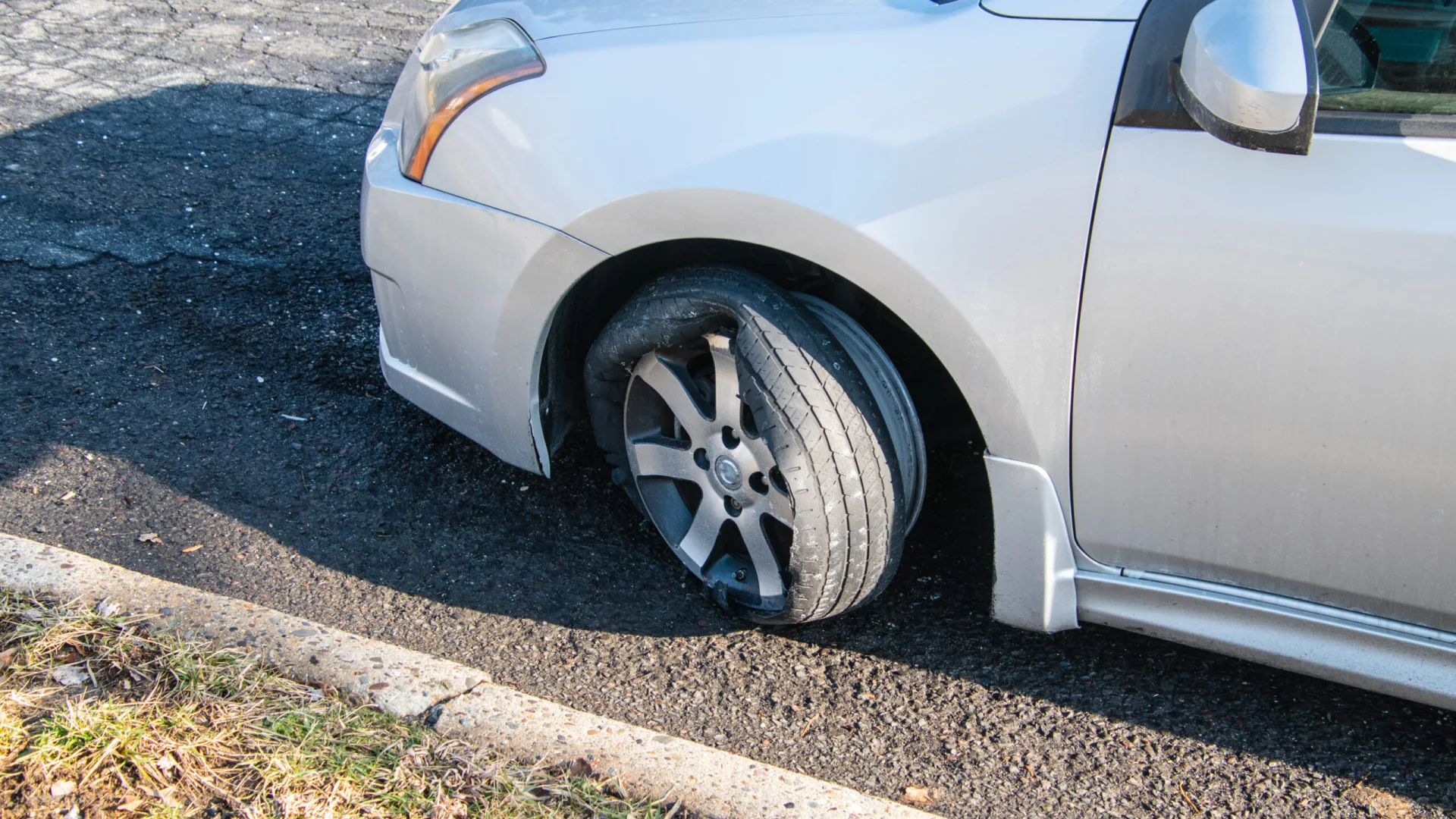 Tire blowout on a vehicle needing roadside assistance