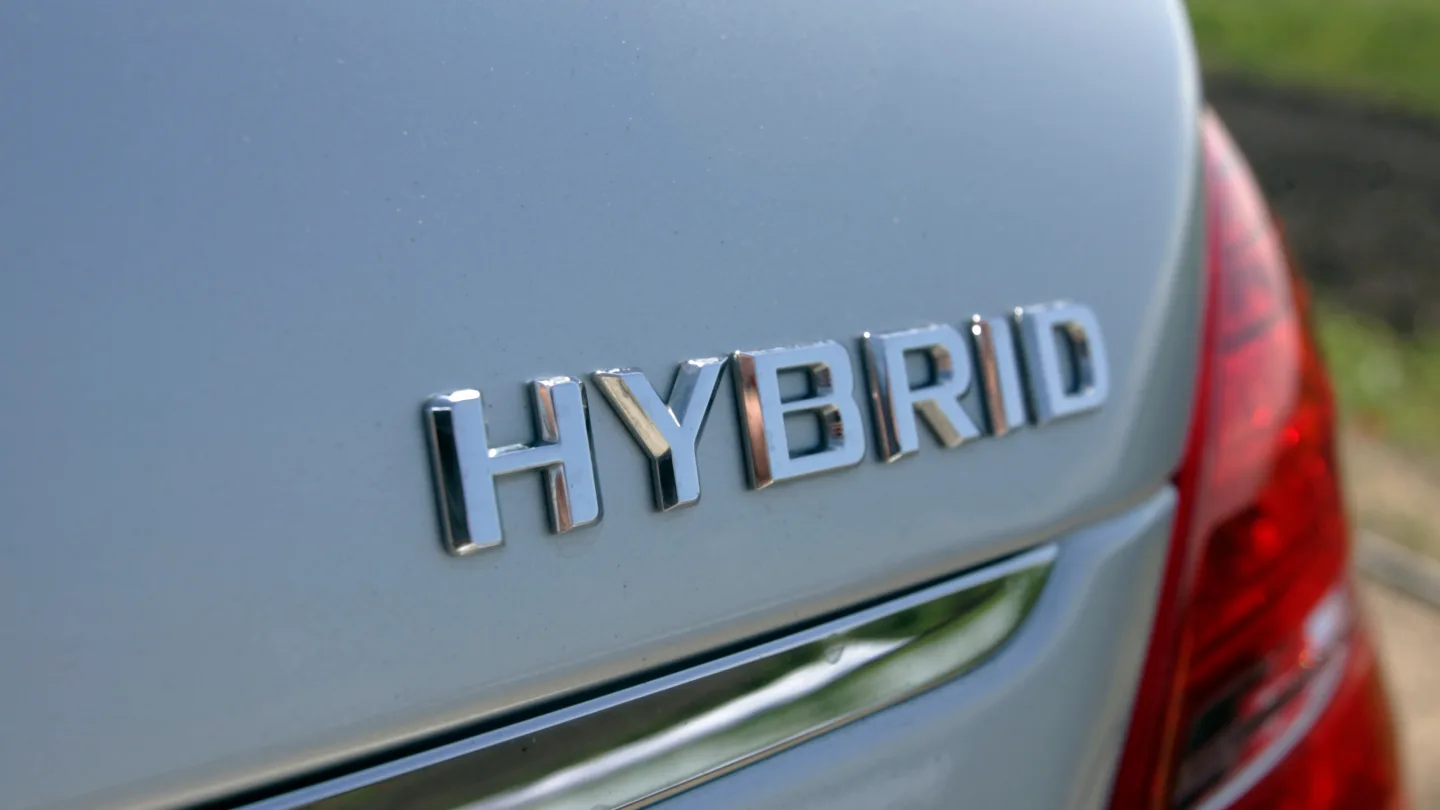 Hybrid vehicle parked for roadside assistance support